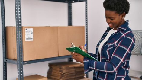An entrepreneur managing her inventory in a self storage unit.